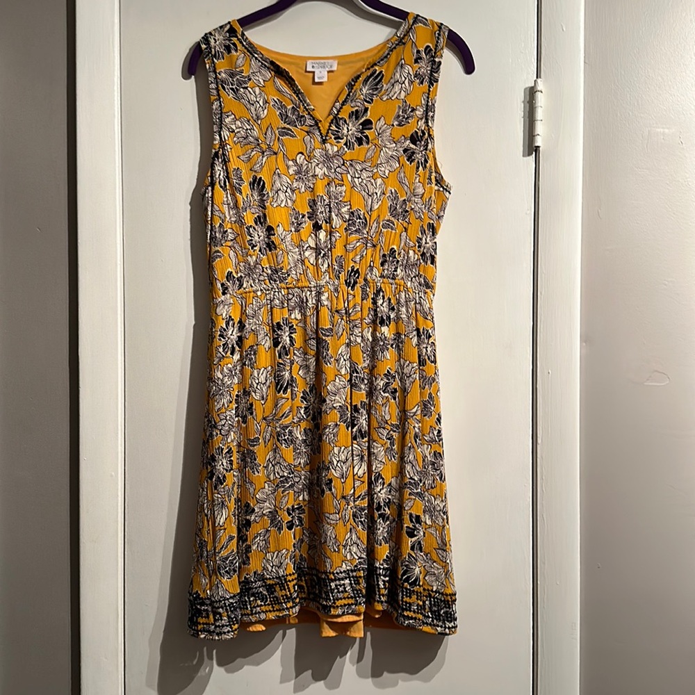 Yellow dress with beautiful stitching on bottom